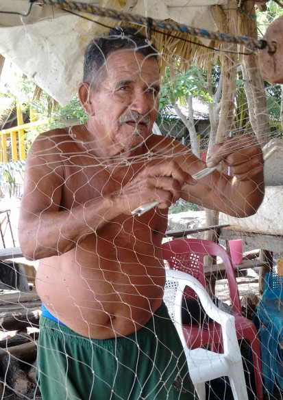 Grandpa, mending the nets